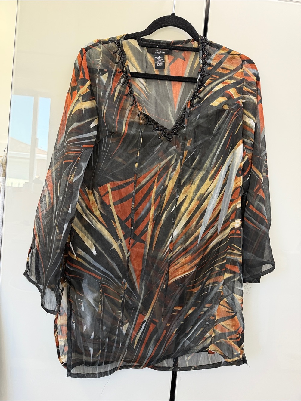 Cejon Sheer V-Neck Tunic in Black, Orange & Gold Leaf Print
